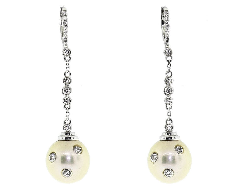 18k White Gold Pearl Earrings With .85ct of Diamonds